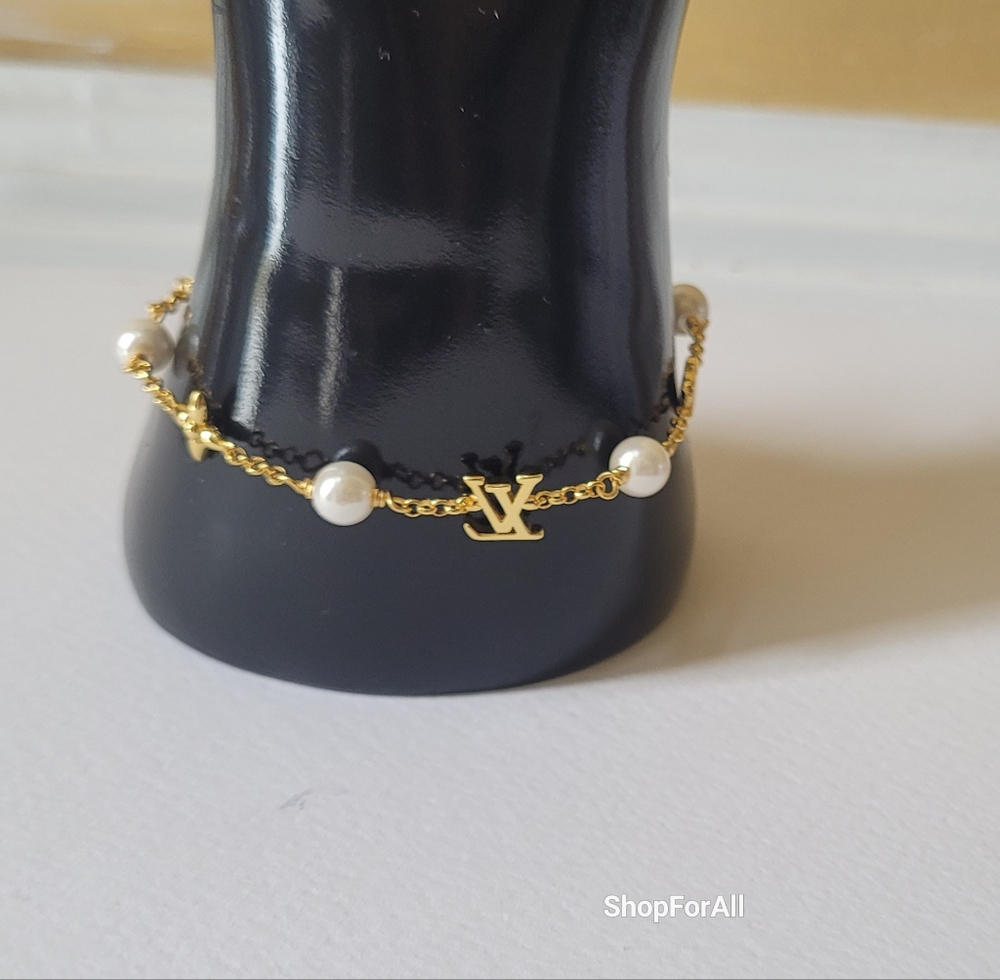 Louis Vuitton Gold Tone Charm Bracelet - Picture 12 of 17